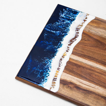 Angled side shot of handmade horizontal-style resin board