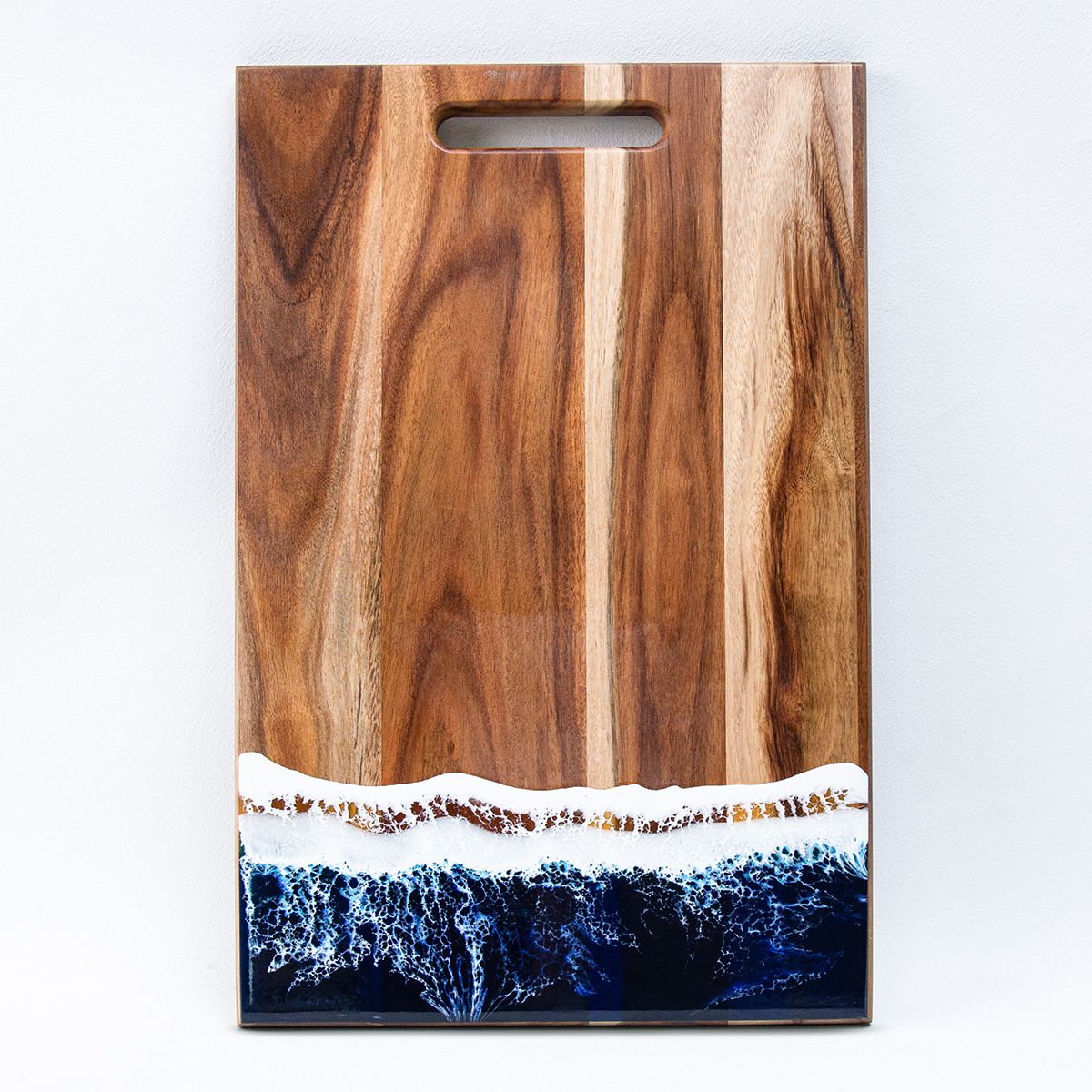 Front view of Blue Horizon resin cutting and serving board made with acacia wood For UK home decor