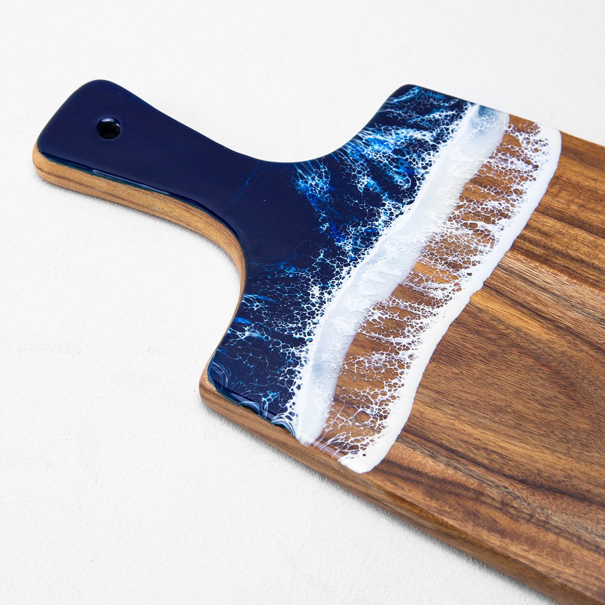 Decorative resin board used for charcuterie presentation