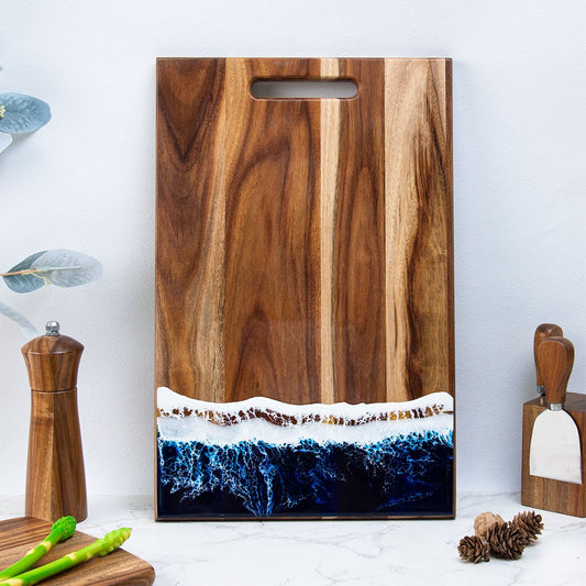 Close-up of glossy ocean resin art on acacia board surface 
